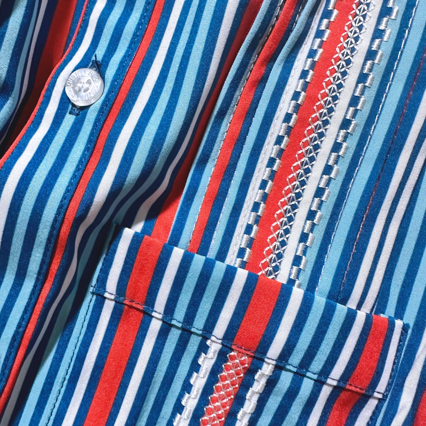 close up of red, white and blue stripe shirt