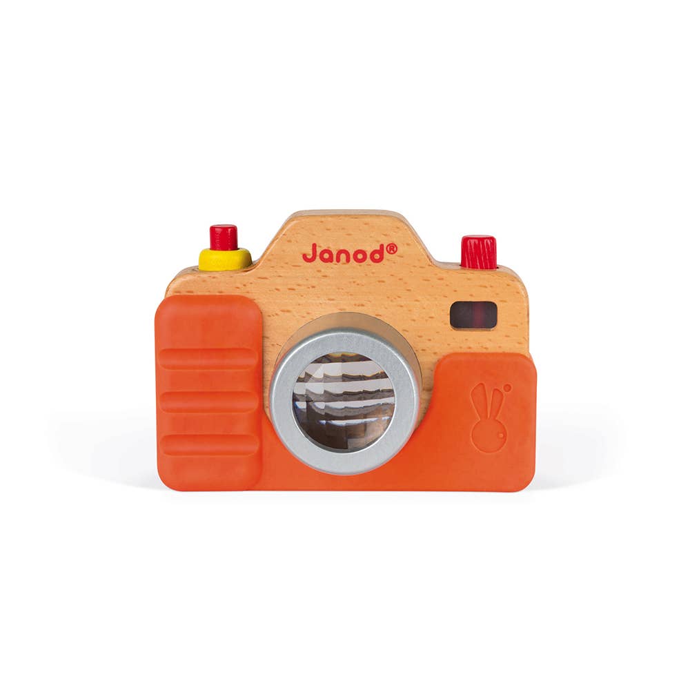 Wooden toy camera with orange body and wooden accents on a white background