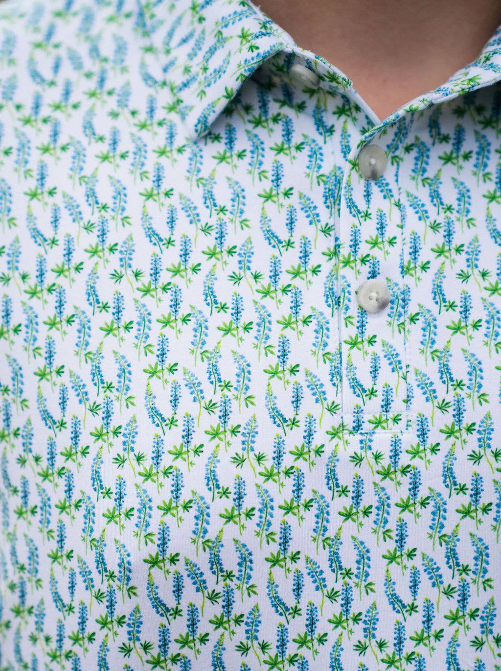 close up of blue floral patterned shirt