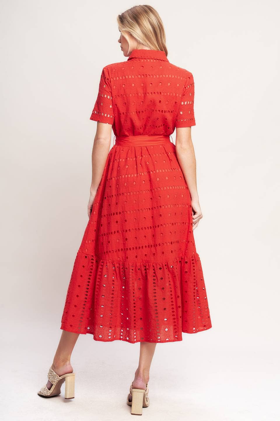 Red dress with a pattern on a white background