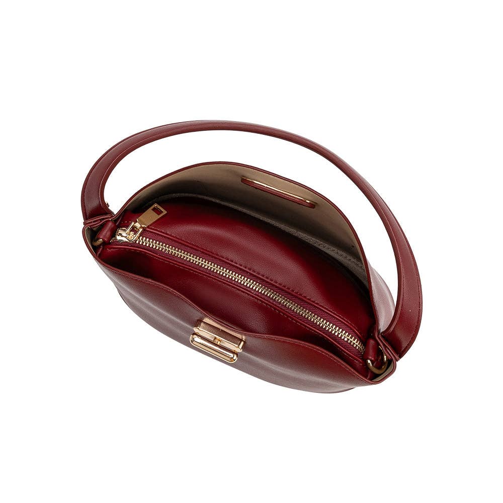 Brown handbag with gold zipper on a white background