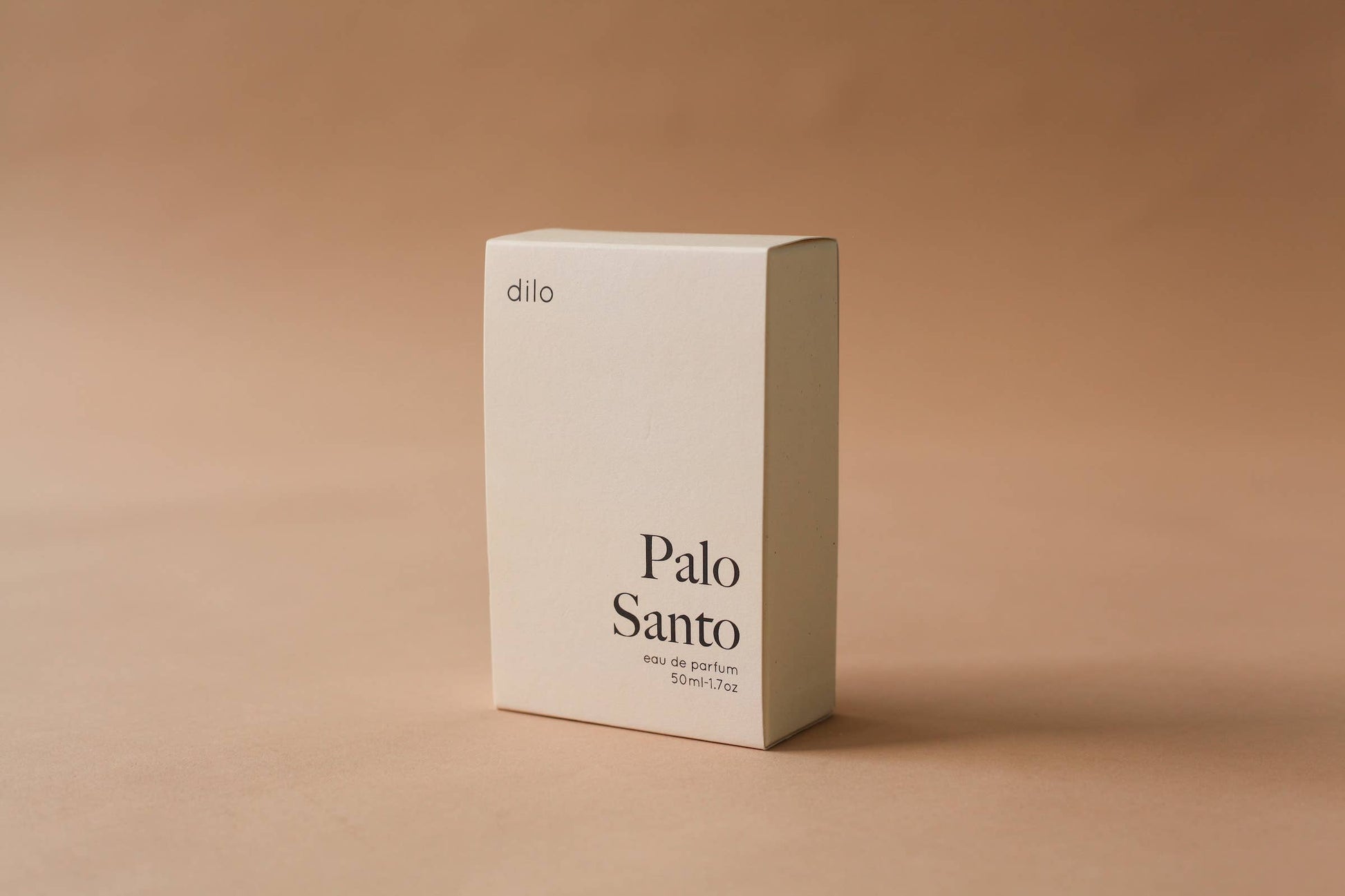 Box labeled 'Palo Santo' by dila on a beige background