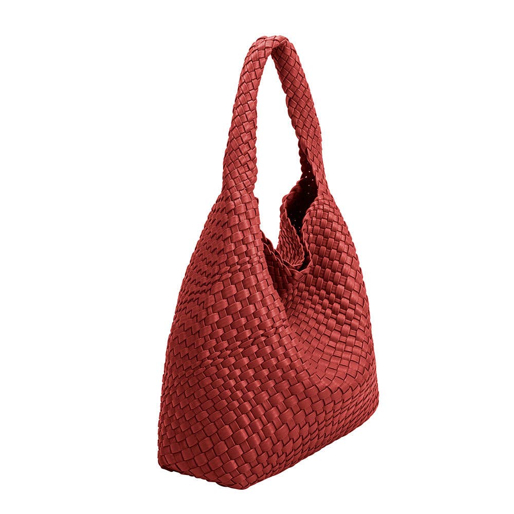 Brown woven handbag with on a white background