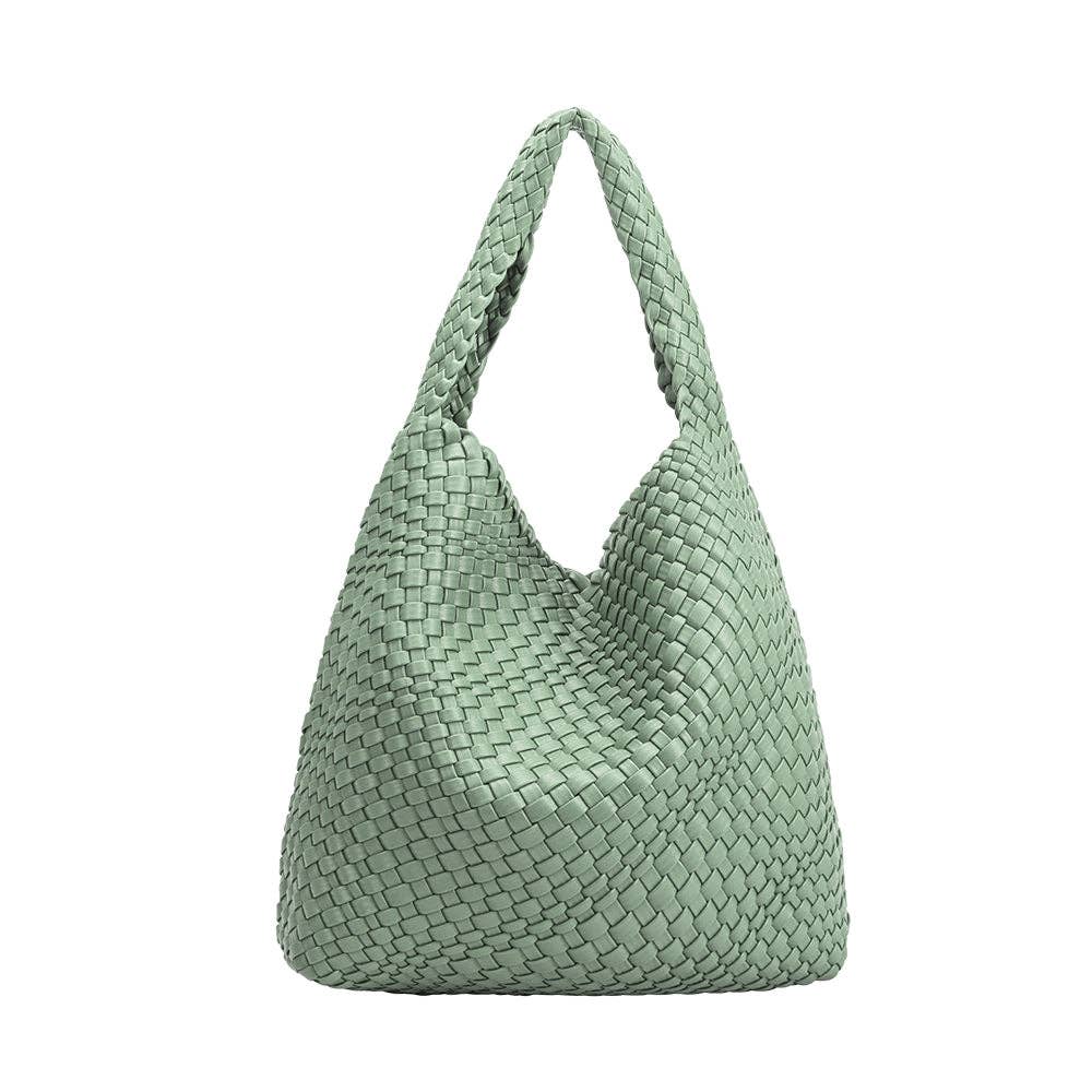 Green woven handbag on a white background