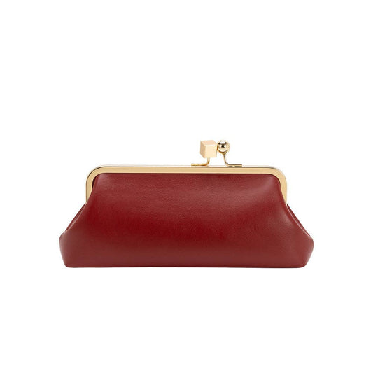 A red leather kiss-lock clutch bag with a gold-tone metal frame and clasp, shown against a plain white background.