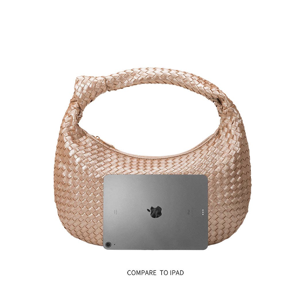 woven handbag with knit in strap on white background, with ipad in front for scale

