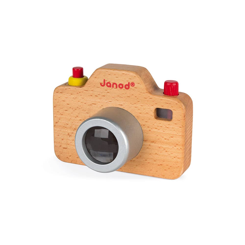 Wooden toy camera with colorful buttons on a white background