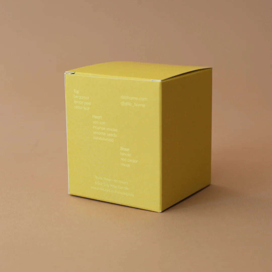 back ofhinoki sesame scented candle packaging