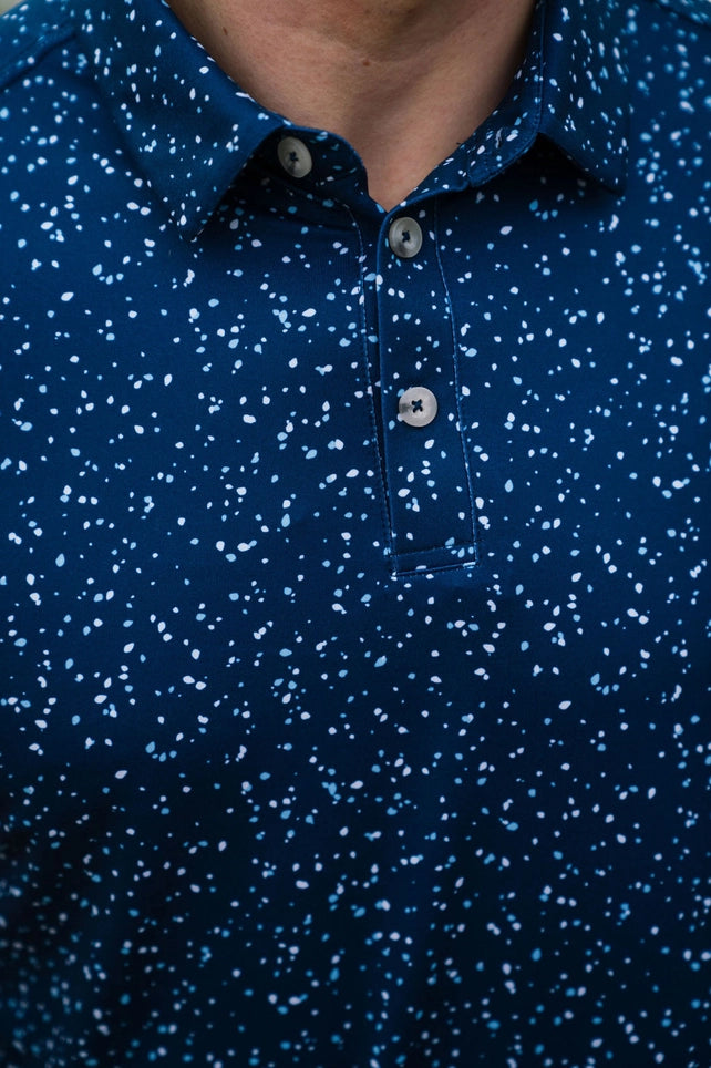 close up of navy speckled polo