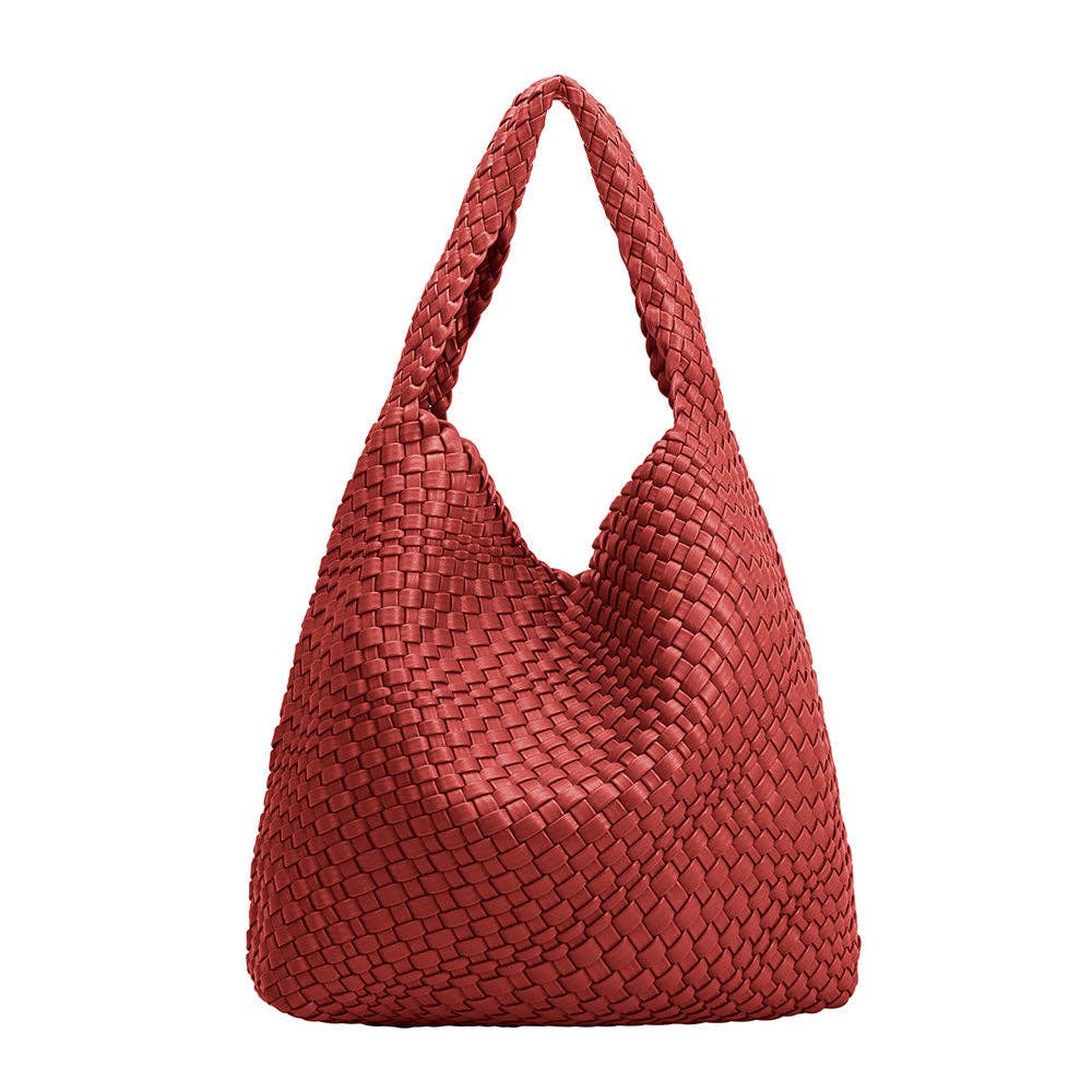 Red woven handbag on a white background