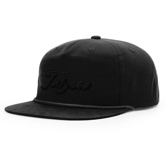 A black snapback hat with 'Texas' embroidered in white script on the front.