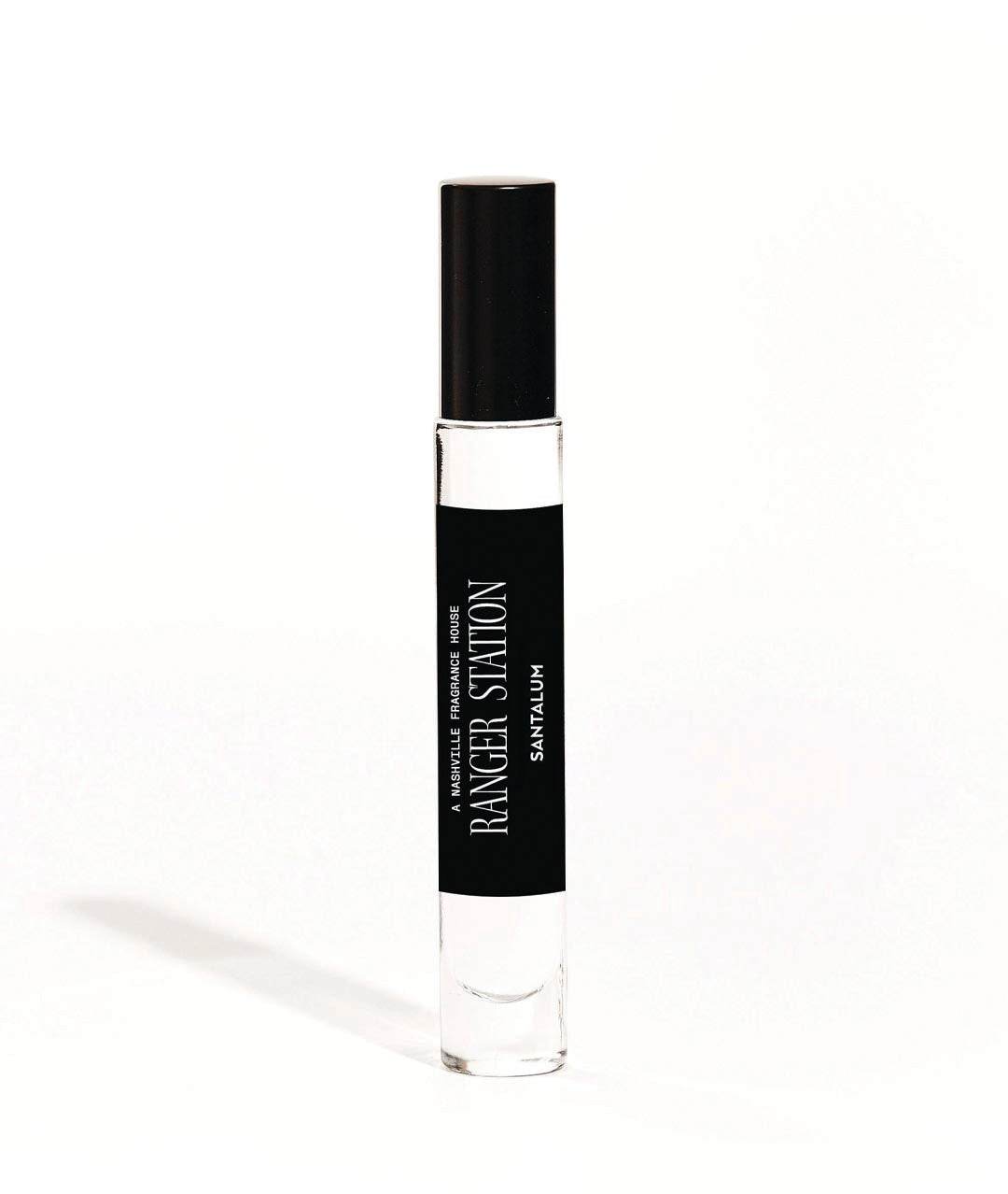 A 10ml bottle of unisex perfume with a black spray top and a label that reads 'RANGER STATION Santalum'.