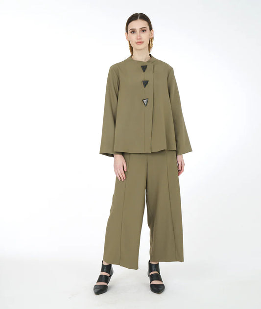 model wearing meadow jacket with 3 triangular buttons in sage and straight leg pants in sage