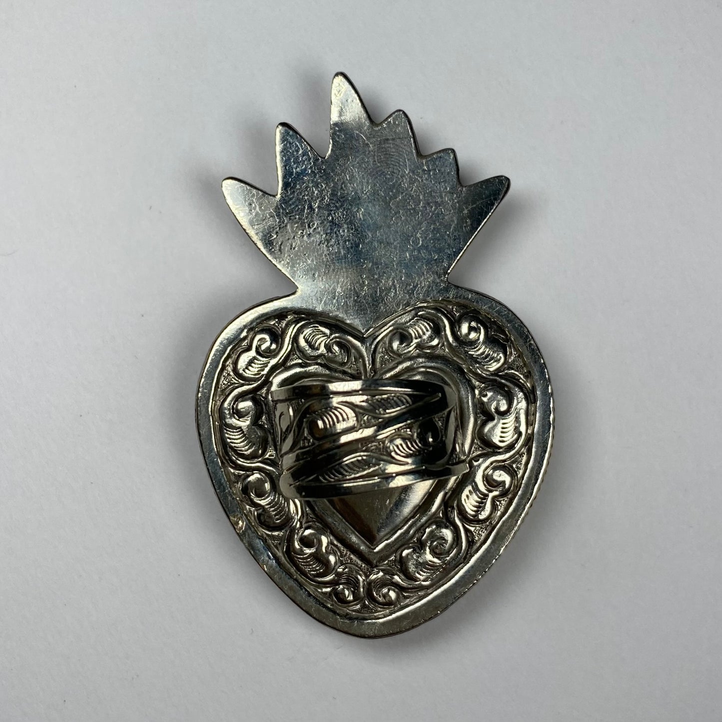 back of heart ring with flames