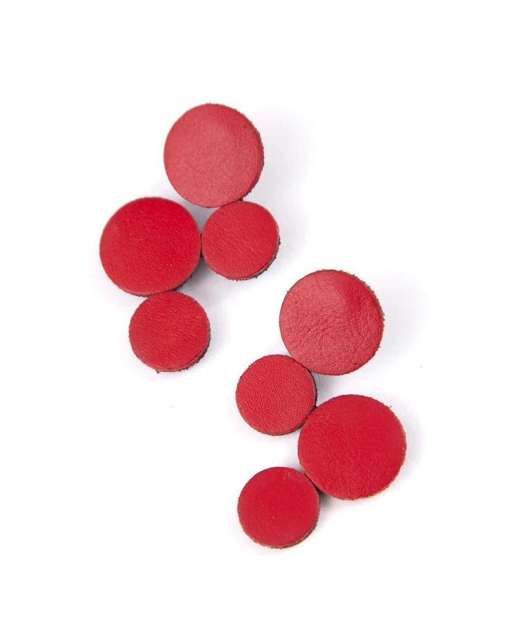 red circle cluster earrings against white background