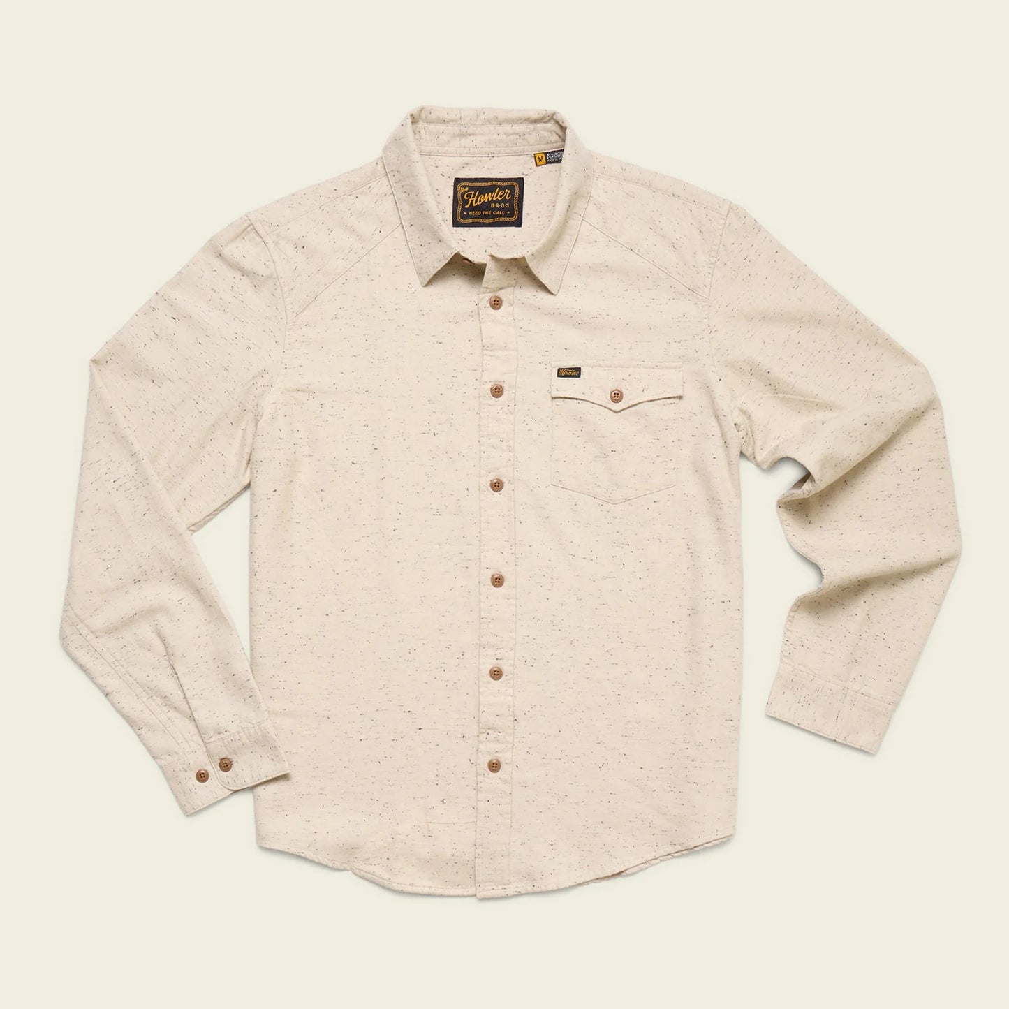 Beige button-up shirt on a light beige background
