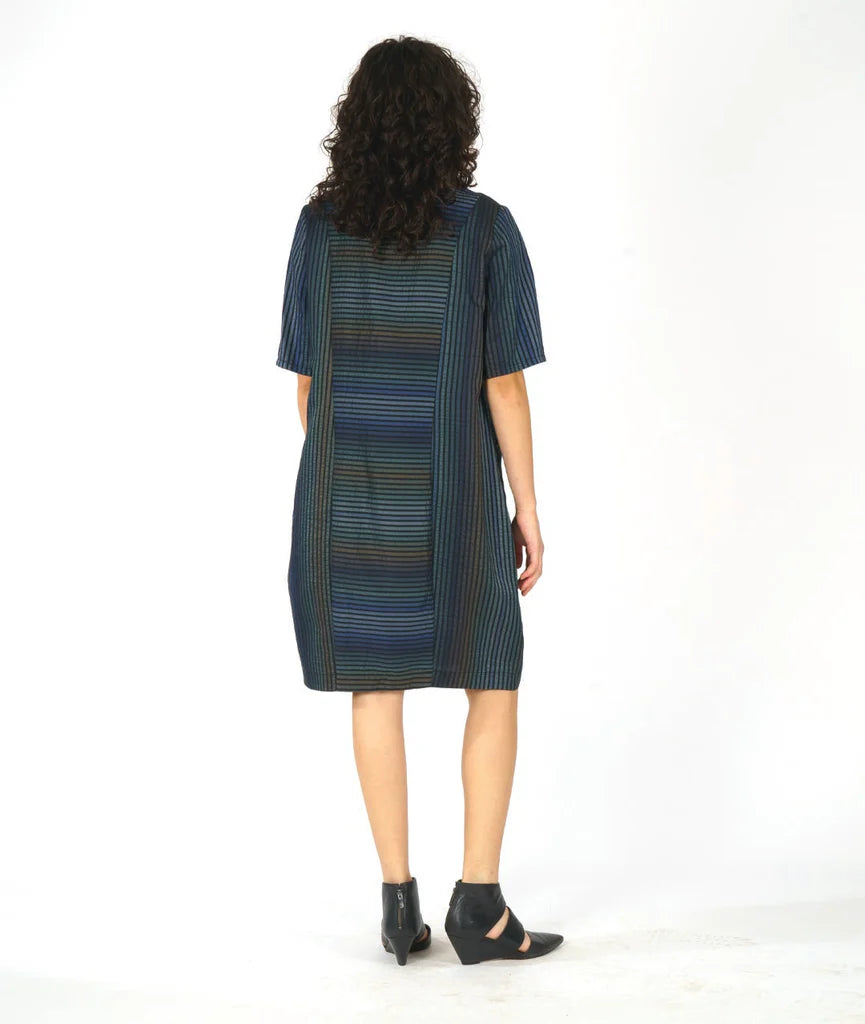 model showing back of striped half sleeve dress on a white background
