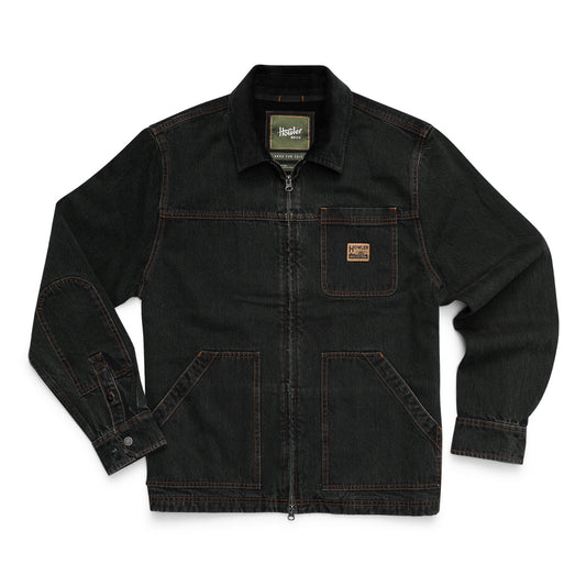 A dark charcoal gray denim work jacket with a full zipper, button cuffs, and a small brown logo patch on the left chest pocket, displayed flat against a white background.