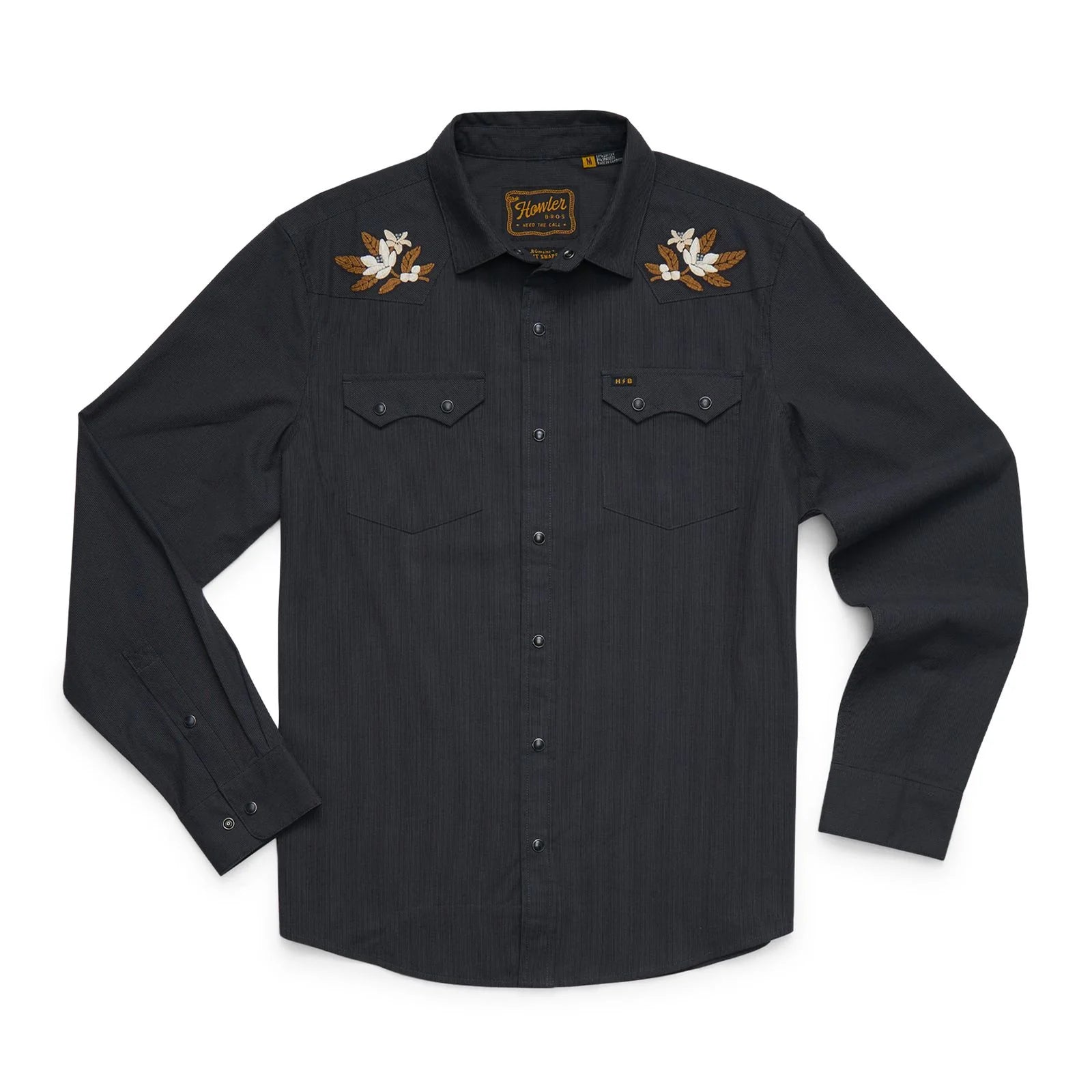 A black long-sleeve button-up shirt featuring embroidery on both shoulders and a small logo patch on the left chest pocket flap, displayed flat against a white background.