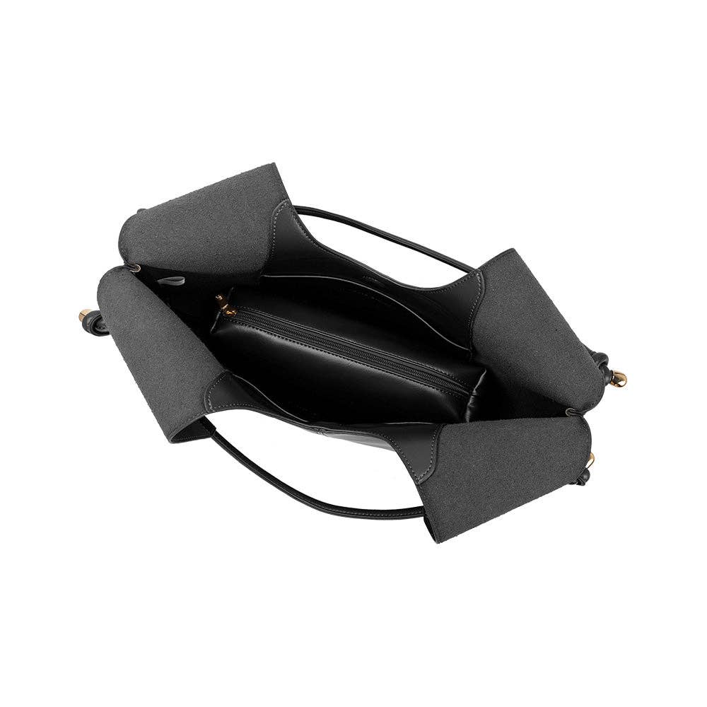 Interior of black leather shoulder bag with knotted design and gold hardware on the handles.