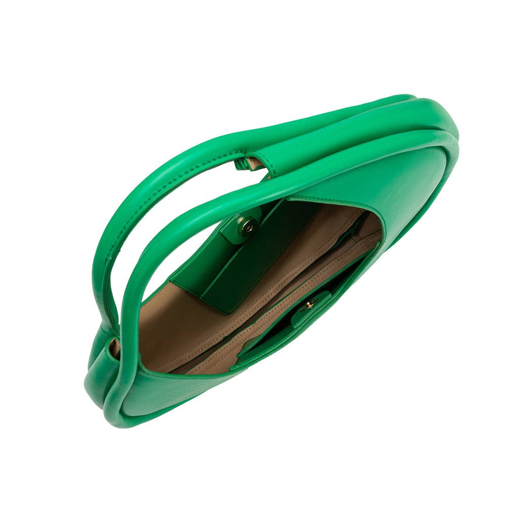 inside look of green circular asymmetrical shoulder bag with double piping structured handles