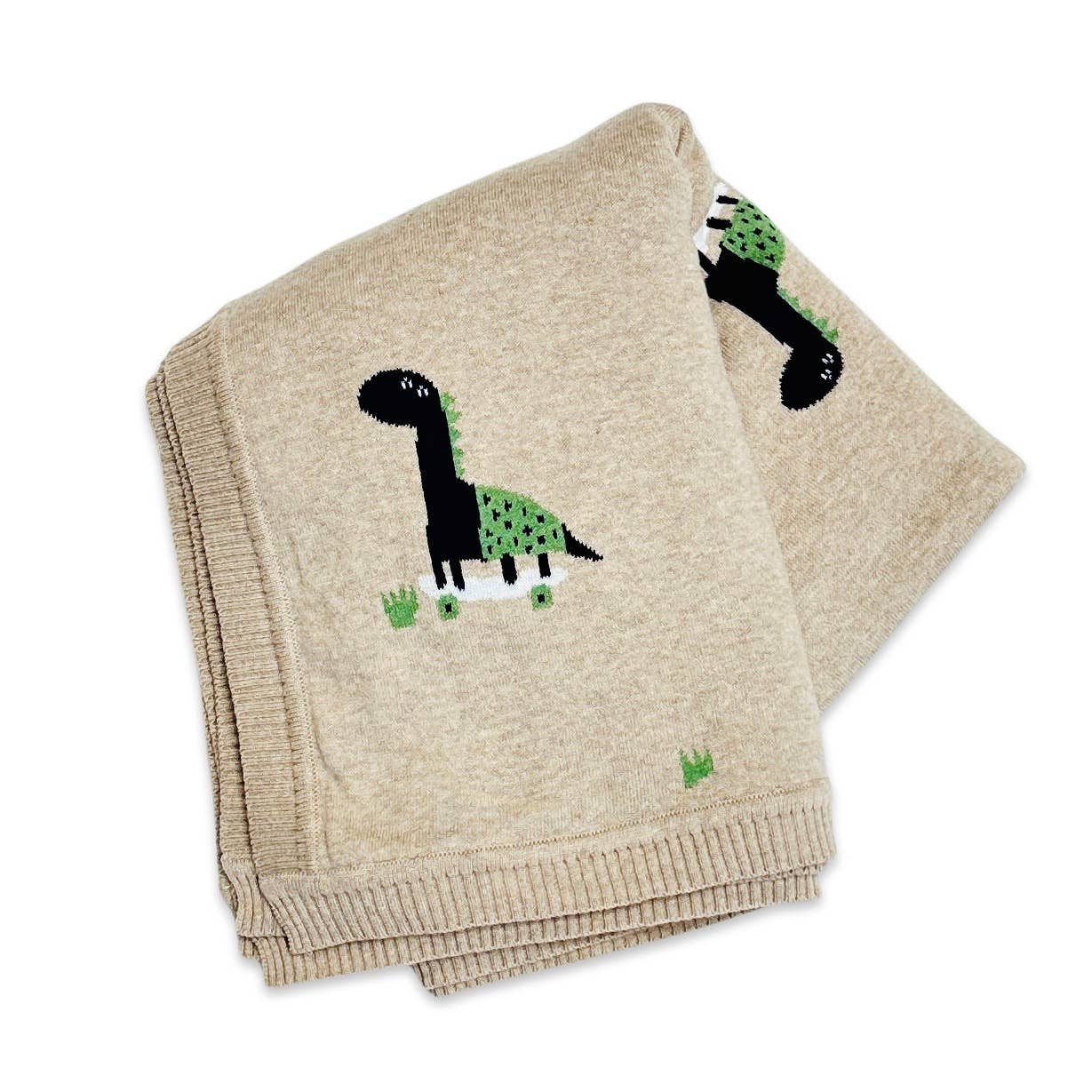 knit baby blanket in tan heather color with images of dinosaurs on skateboards