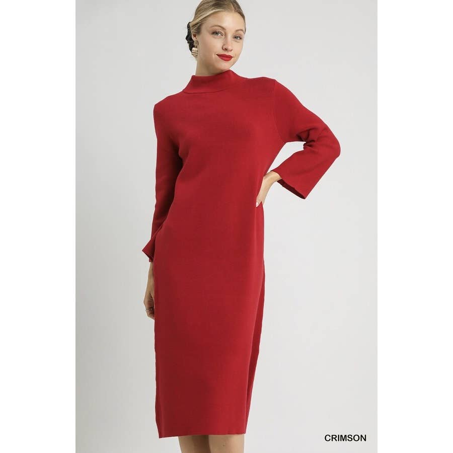 Woman wearing a red midi mock neck knit dress on a white background
