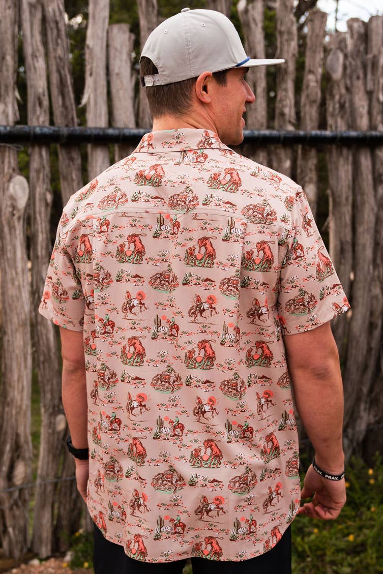 back view of male model wearing khaki patterned shirt