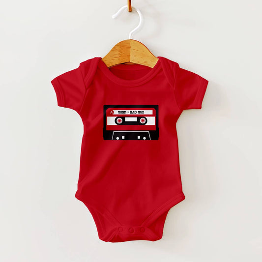 Red baby onesie with a cassette tape design on a hanger against a white background