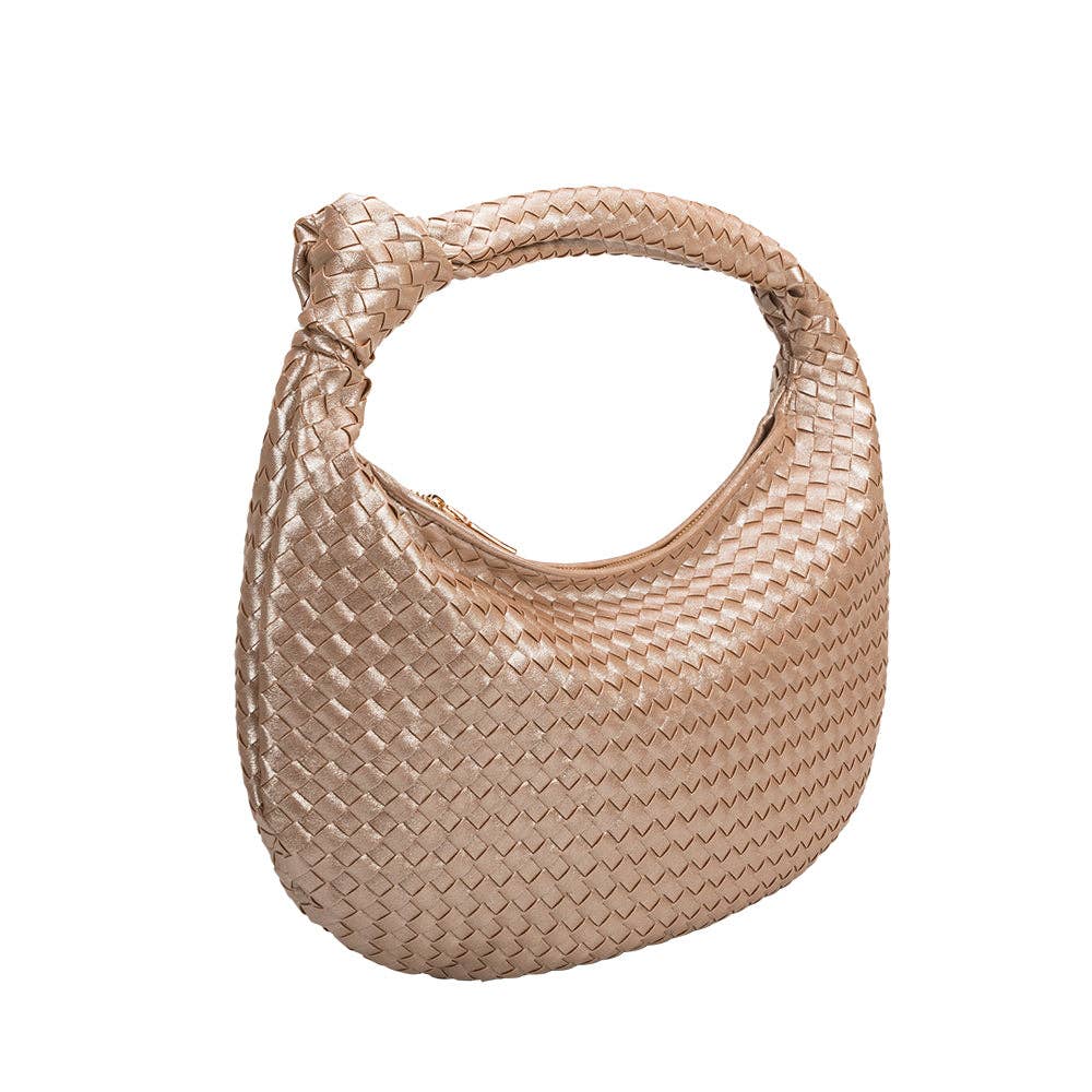 woven handbag with knit in strap on white background