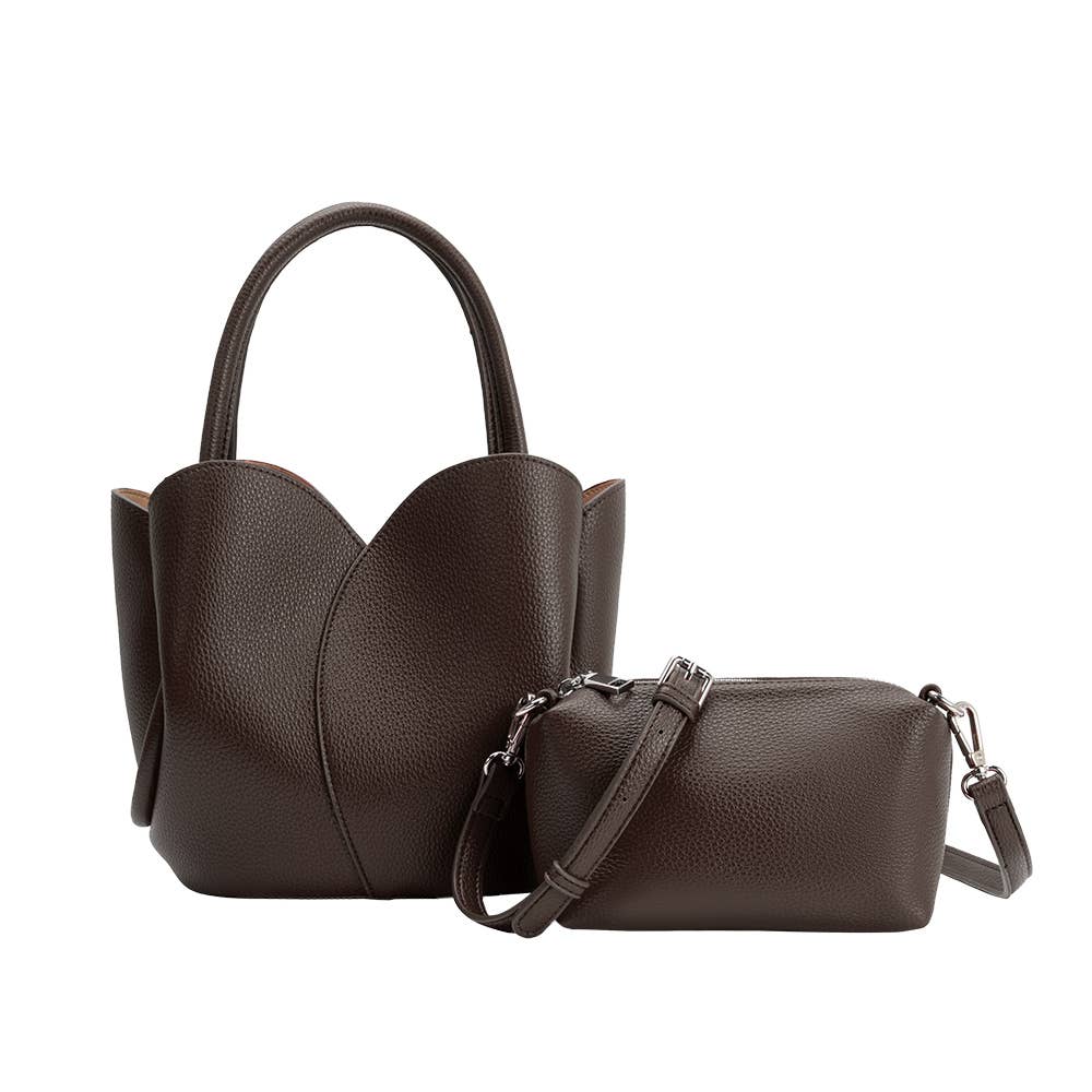 Two brown leather handbags on a white background