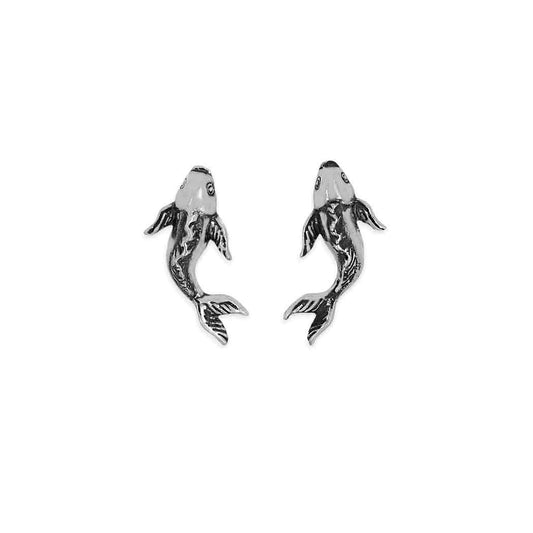 Pair of silver fish-shaped earrings on a white background
