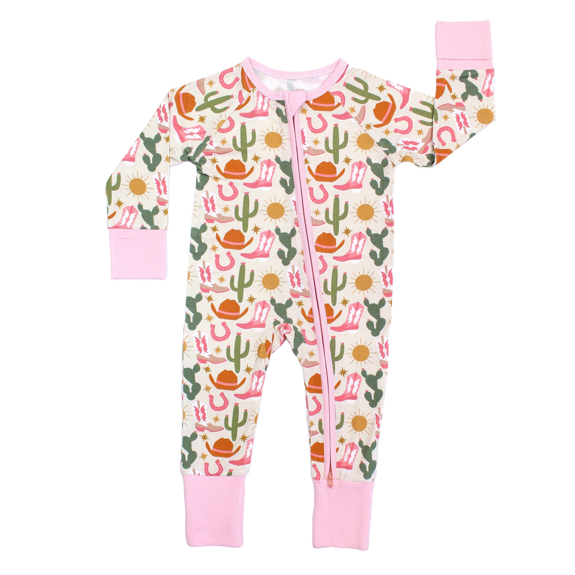 Children's onesie with cactus and cowboy pattern on a white background