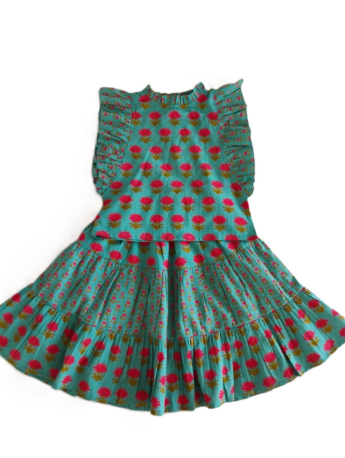 Green dress with pink floral pattern on a white background