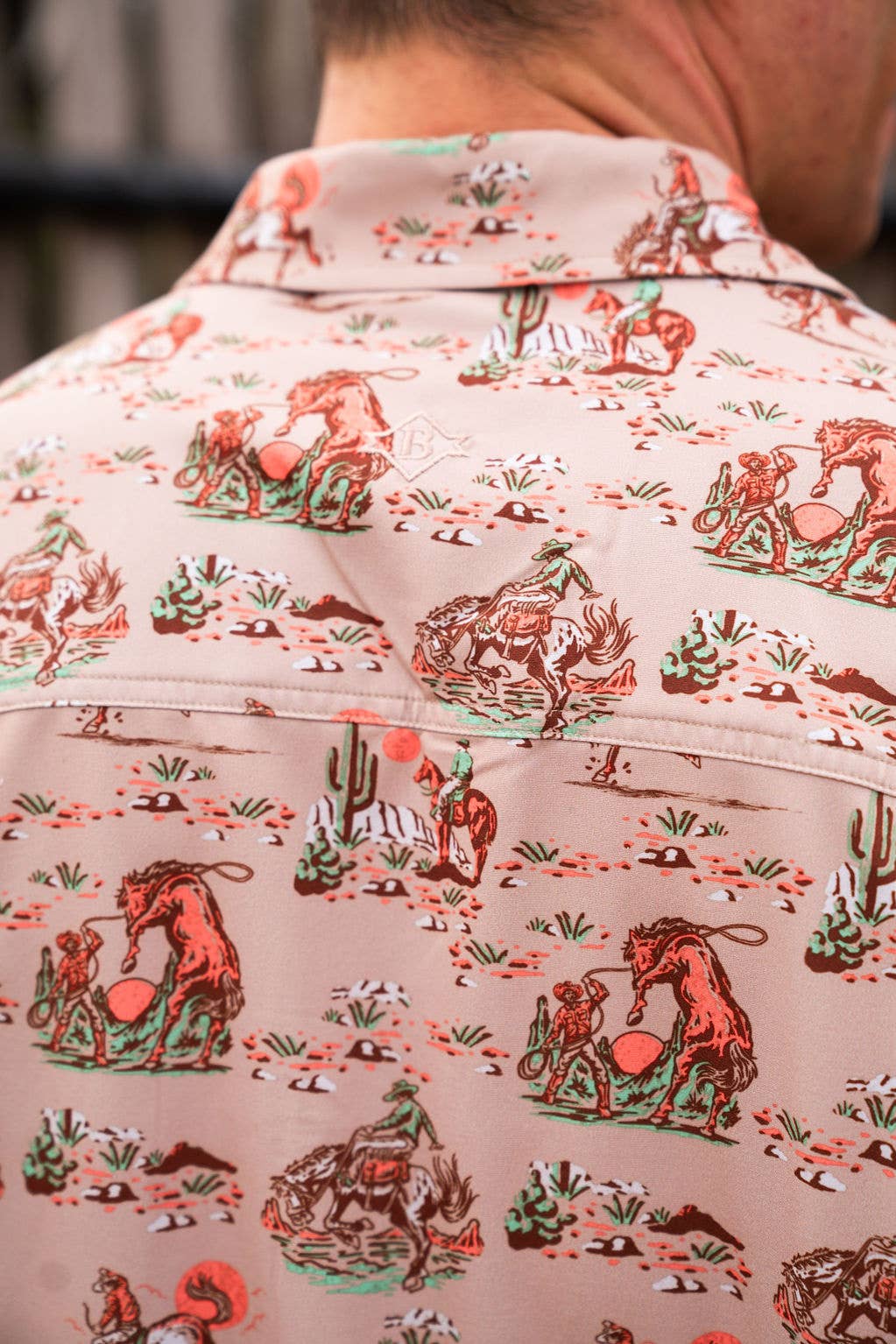 close-up of western pattern on a khaki shirt