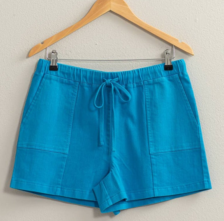 blue drawstring shorts on hanger