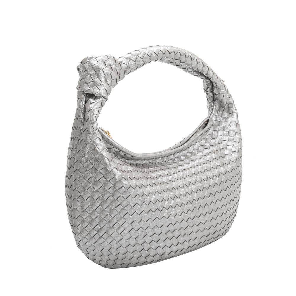 woven handbag with knit in strap on white background