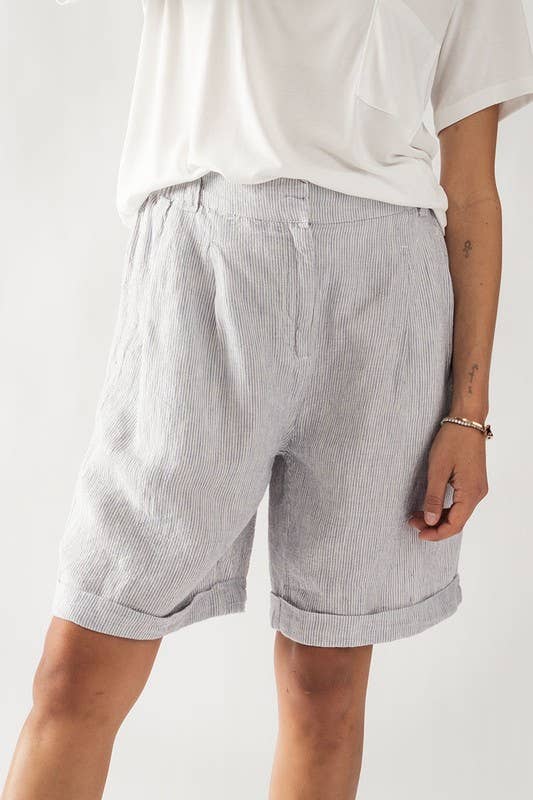 close up of model wearing blue nautical stripe shorts