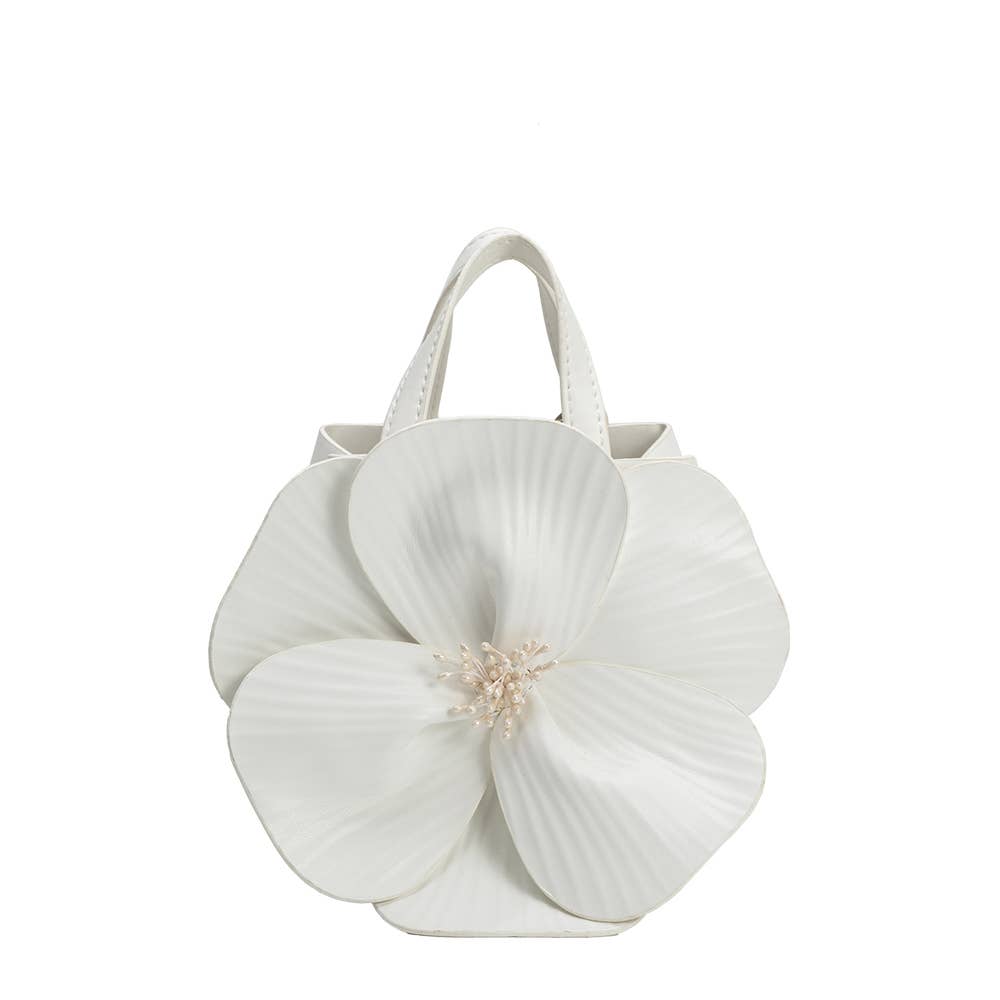 white handbag with large 3d flower