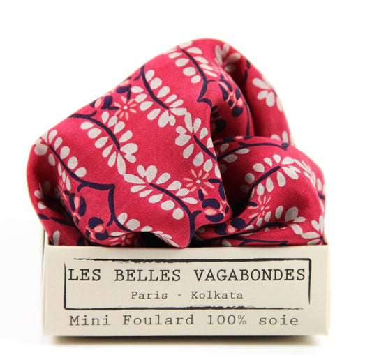 Red floral scarf on a white background with 'Les Belles Vagabondes' branding.