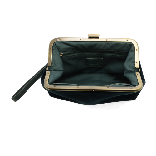 Green handbag with gold frame opened showing inside zipper on a white background