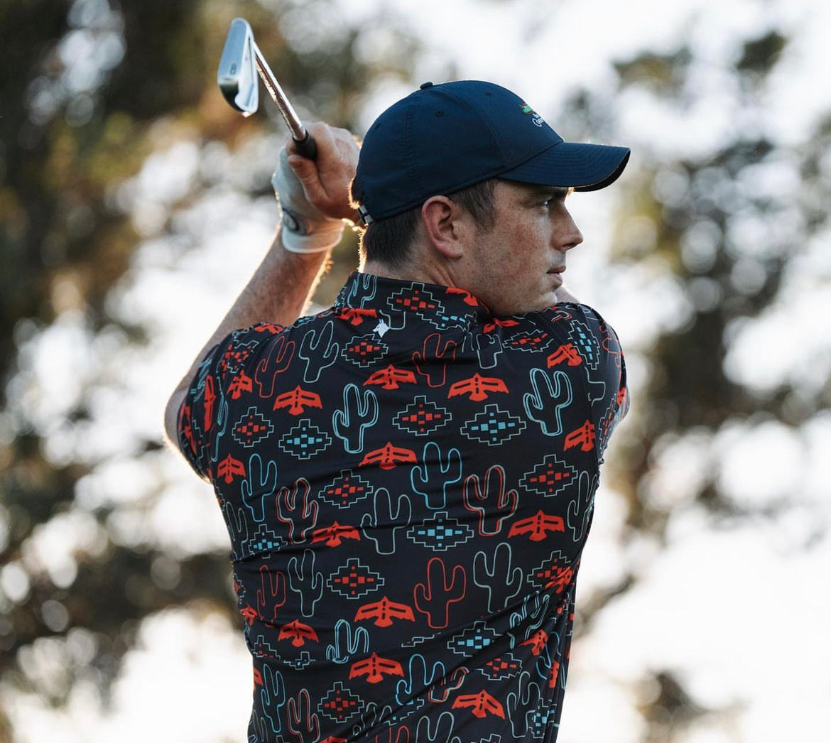 male golfer wearing brown cactus-print shirt