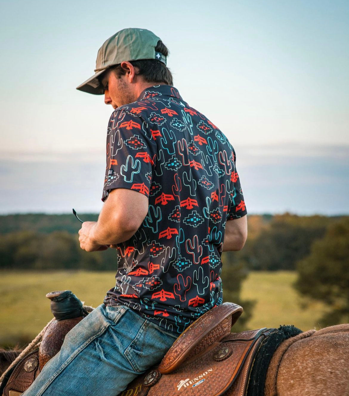 another shot of male model wearing cactus-print shirt