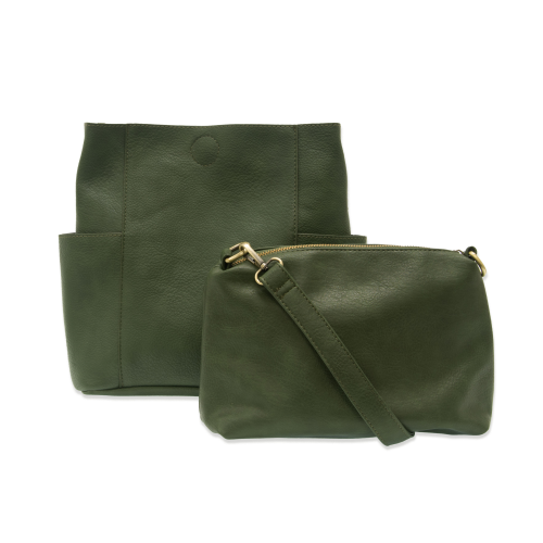 green vegan leather bag with pockets on each side and shoulder strap with removable bag