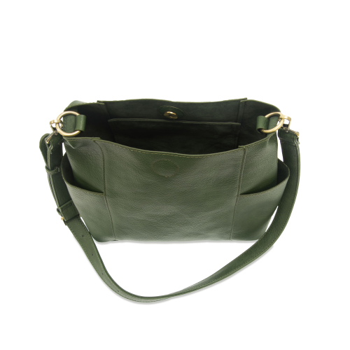 top view of green vegan leather bag with pockets on each side and shoulder strap