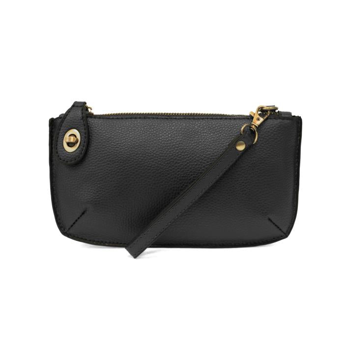 black leather clutch on white background