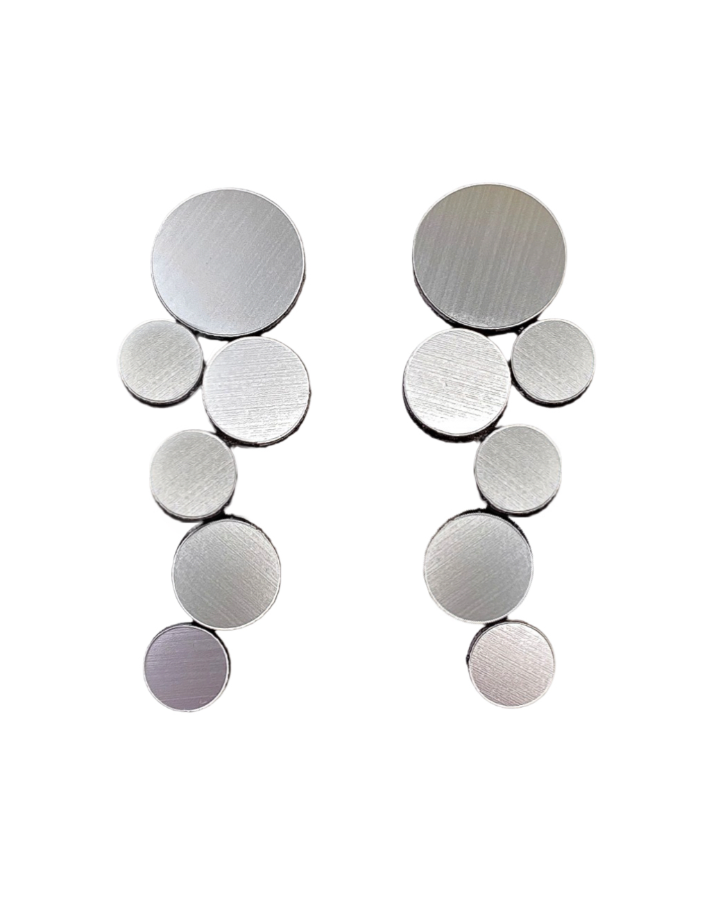 Silver circle cluster earrings against white background