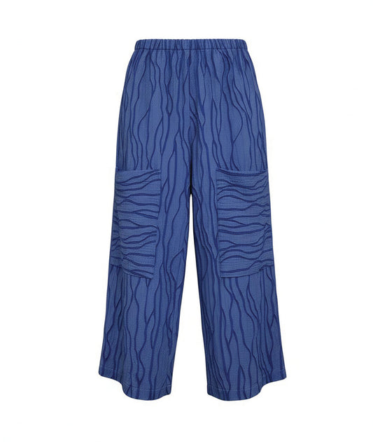 Blue patterned pants on a white background