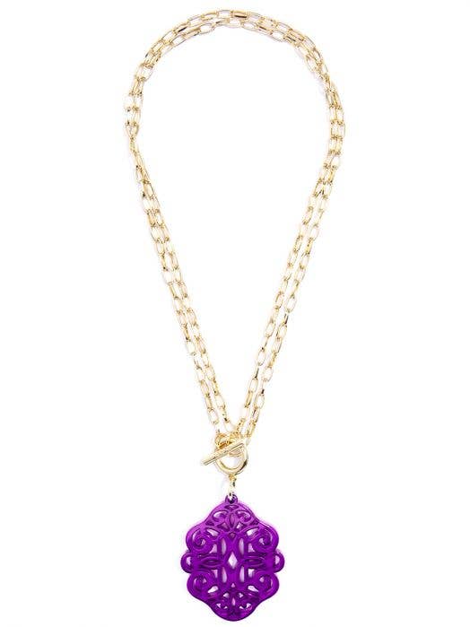 gold chain necklace with purple abstract pendant