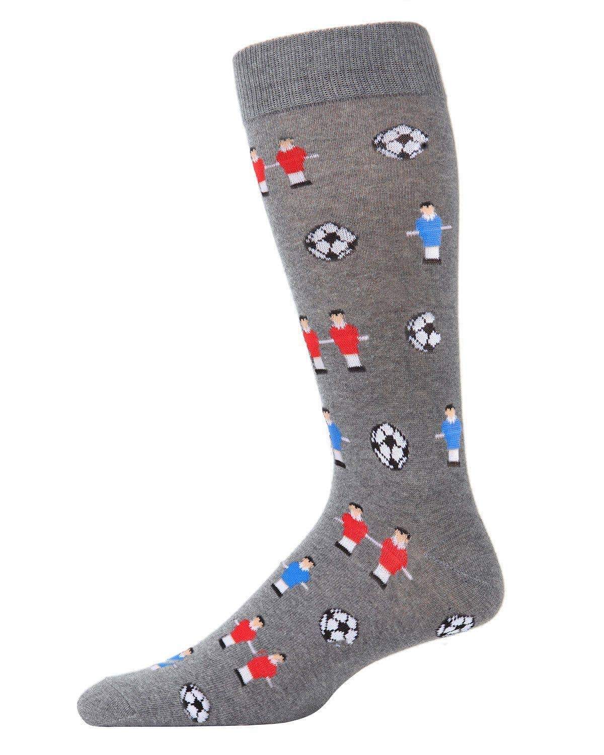 grey socks with foosball and players. on a white background